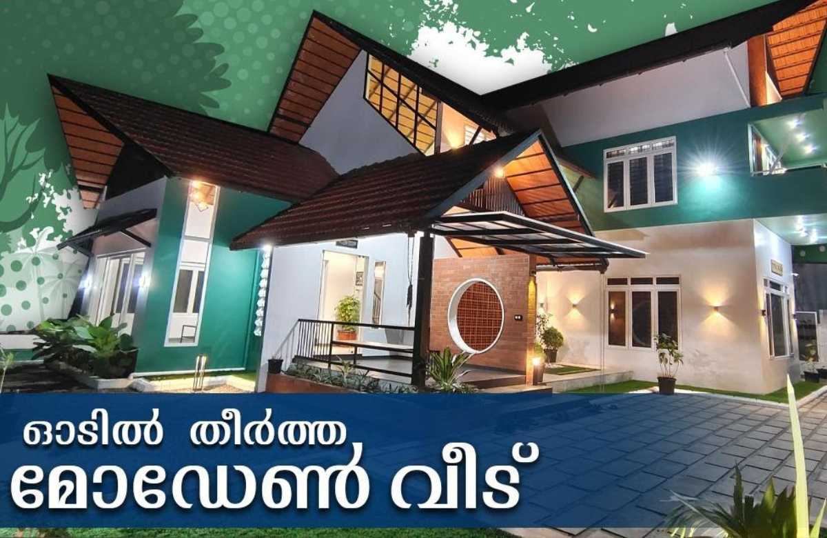 A tropical modern slope roof home malayalam