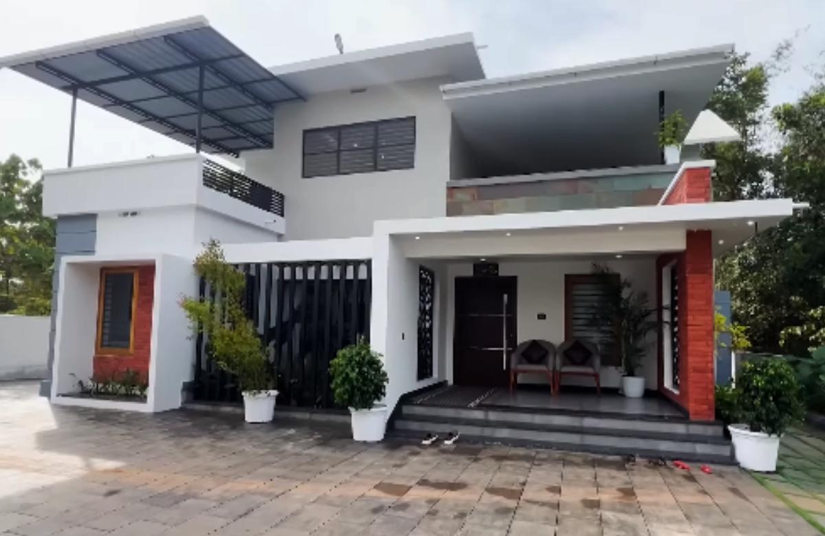 Modern home in 7.5 cent 2070 sqft malayalam